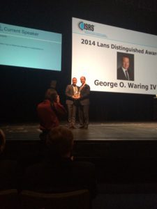 Dr. George O. Waring IV being presented with the 2014 Distinguished Lans Award from the international Society of Refractive Surgery